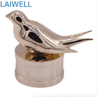 Moderne en modieuze zink legering parfumfleskappen met aangepast vogelontwerp voor high-end geuren