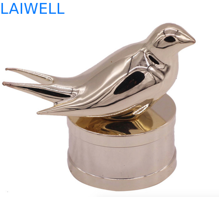 Moderne en modieuze zink legering parfumfleskappen met aangepast vogelontwerp voor high-end geuren
